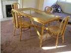 Dining table with 5 chairs - Cane/wicker with glass....