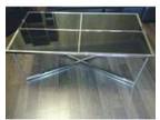 Black Glass & silver chrome coffee table. This is a....
